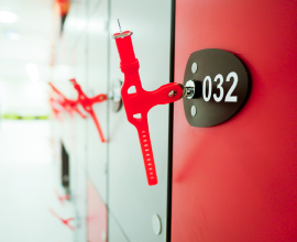 Image of sports locker with key in the lock